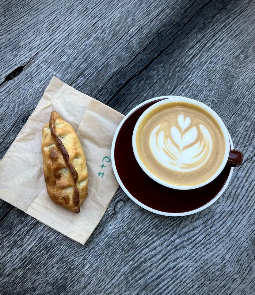 Con Leche Coffee, latte and empanada